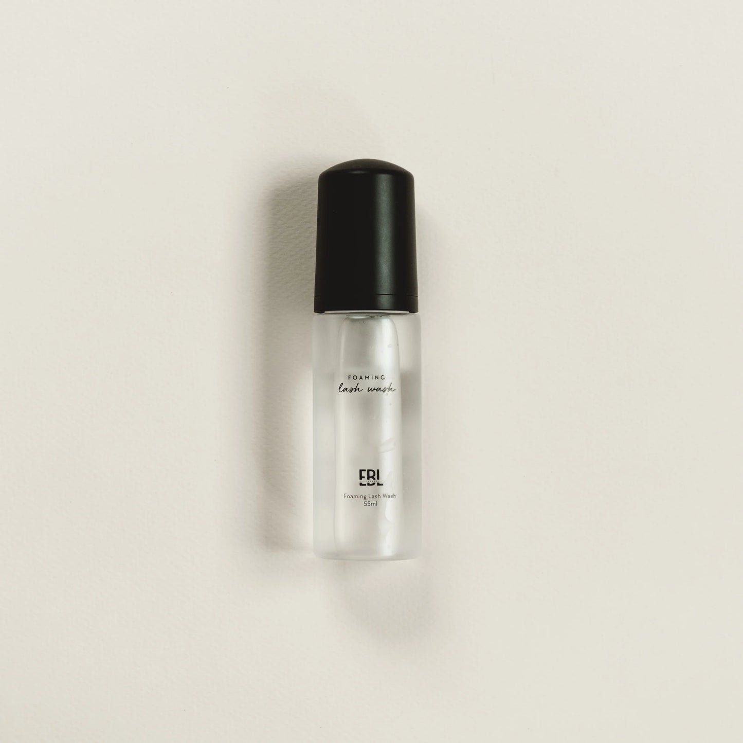 Foaming lash wash