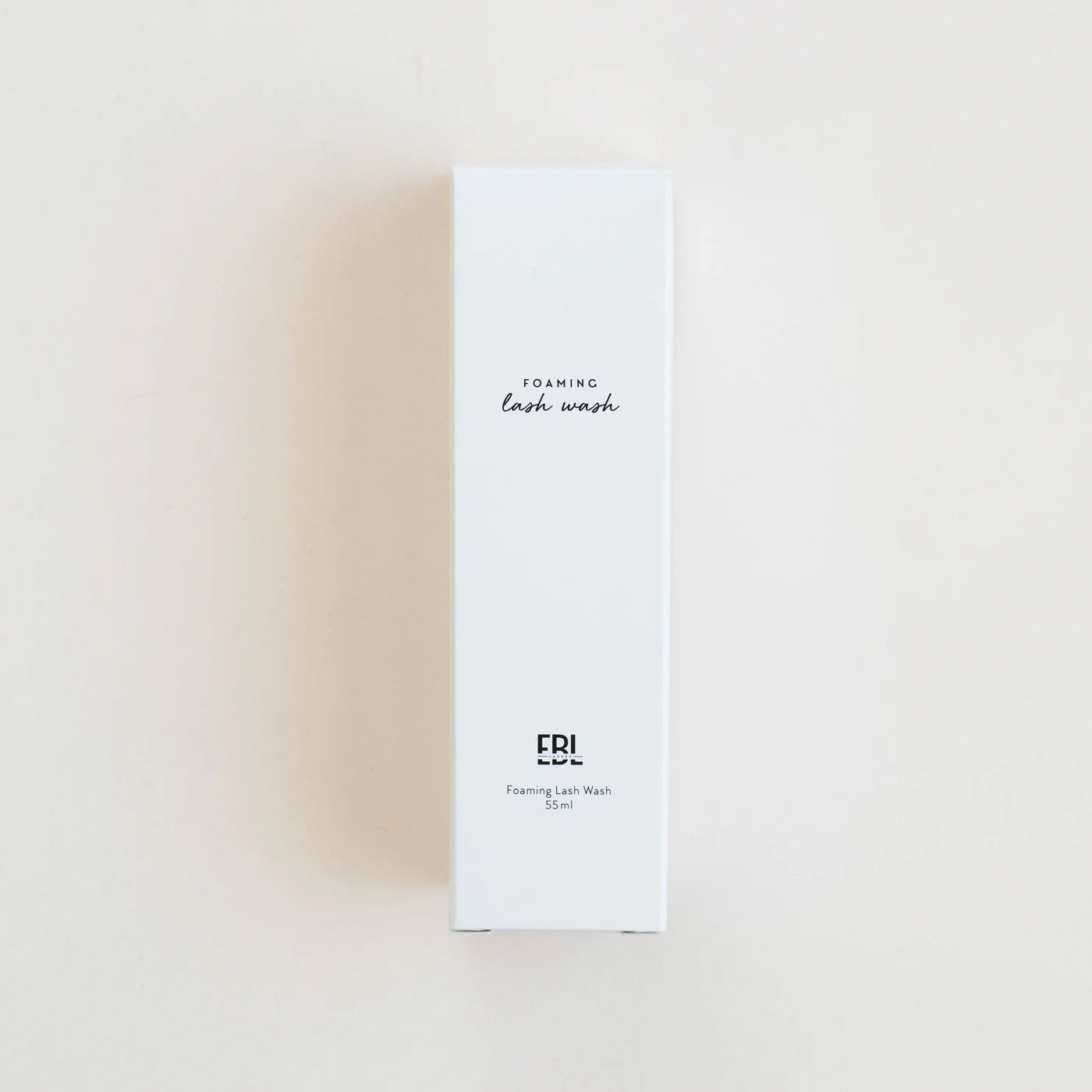Foaming lash wash